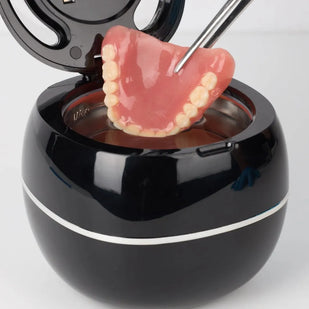 2. Place dentures in